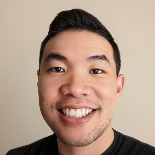 Ryan Iinuma A headshot photo of Ryan Iinuma